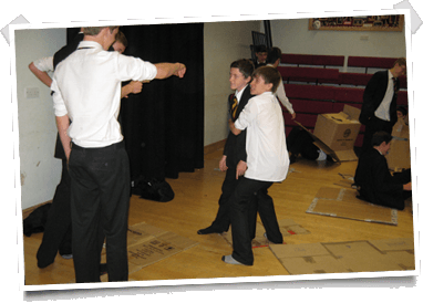 School children taking part in an Acting on Impulse workshop